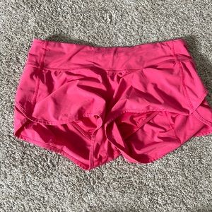 Pink lululemon speed shorts